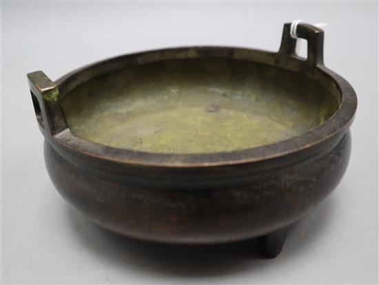 A Chinese bronze shallow tripod censer, Qianlong mark, late Qing, diameter 15cm, together with a Canton ivory card case
